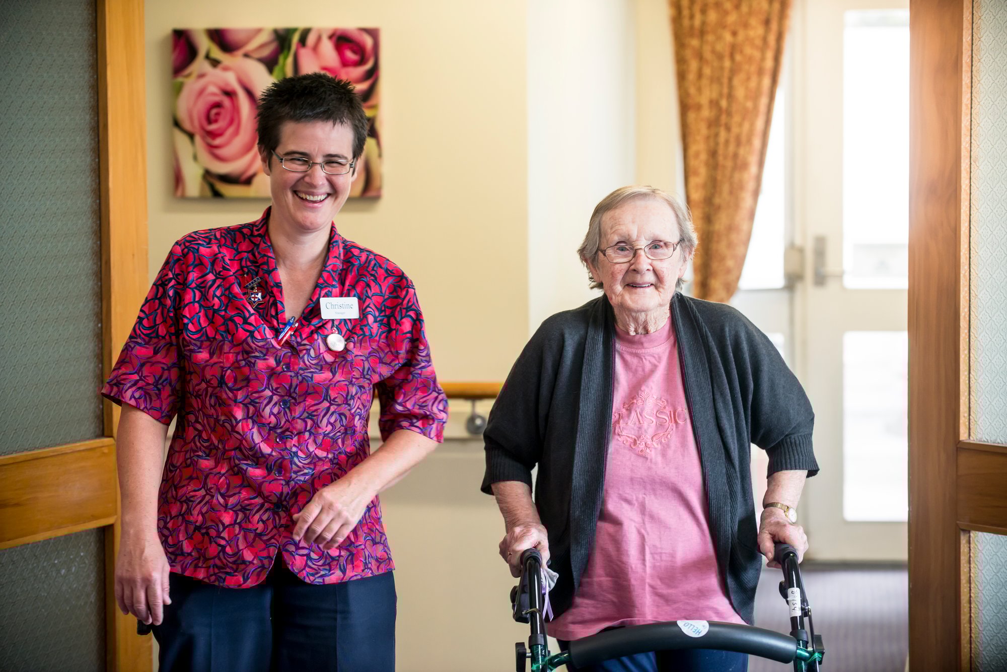 Smiles from staff and resident of Enlivens Willard Home
