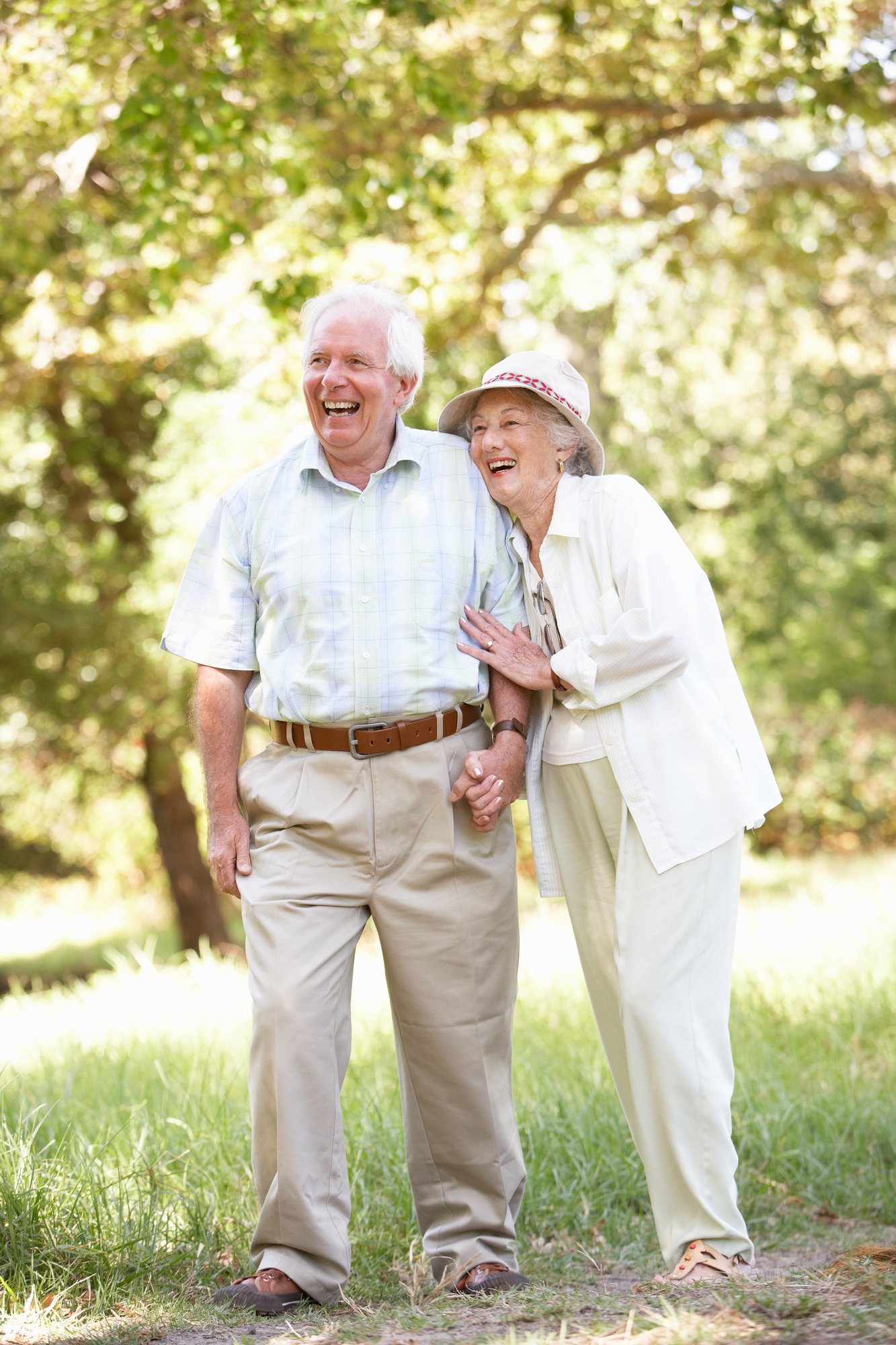 smiling couple outside in park Fotolia_23405038