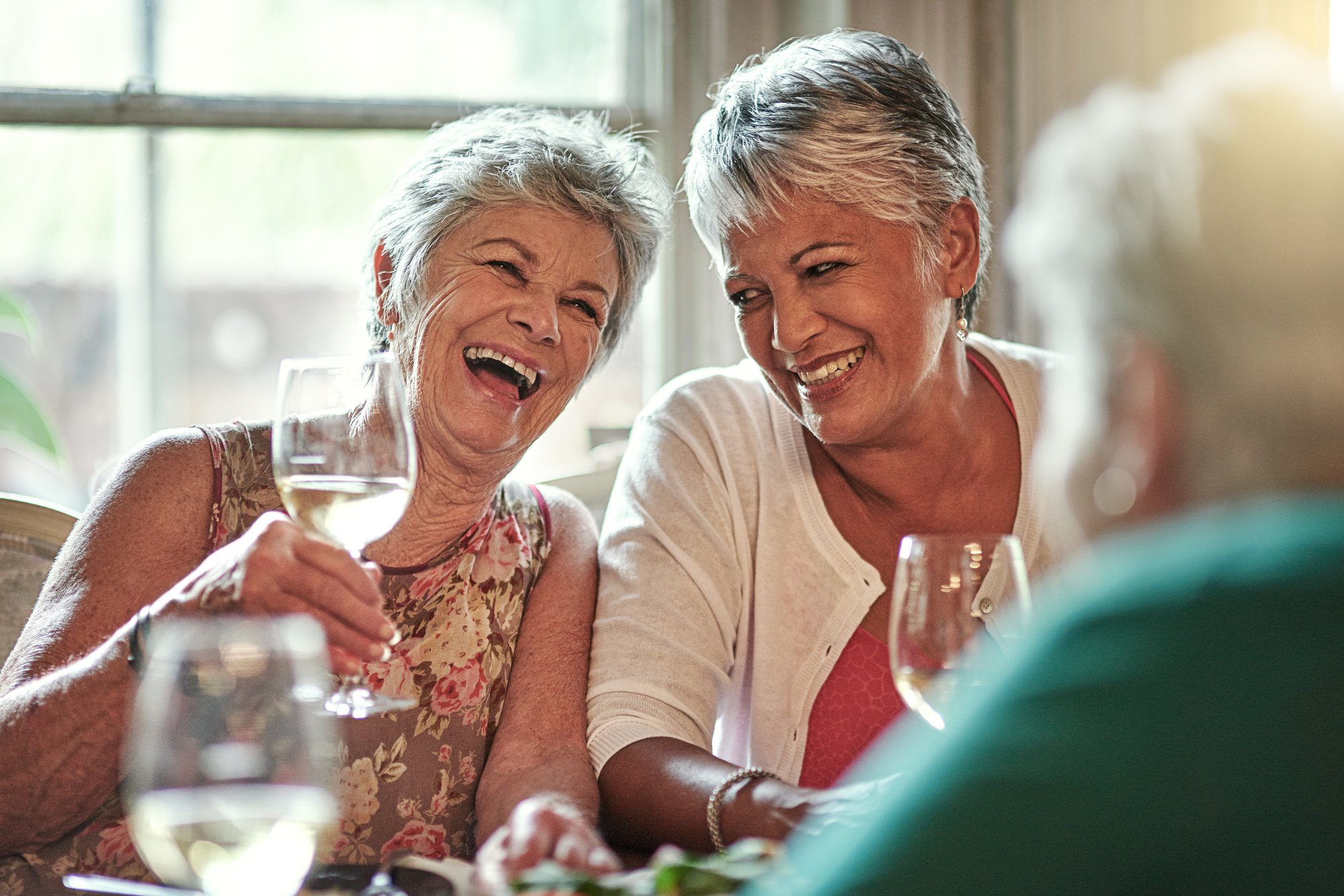 two ladies drinking wine_iStock_93282797